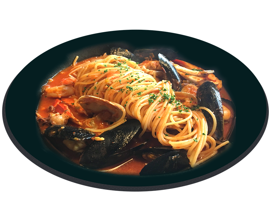 Spaghetti with Rich Tomato Meat Sauce in Black Oval Serving Dish PNG Image