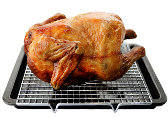 Herb Roasted Thanksgiving Turkey in Metal Roasting Pan on Rack PNG Photo