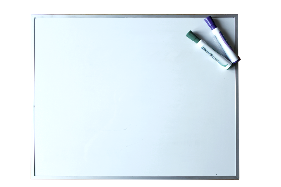Blank Whiteboard with Purple and Green Markers