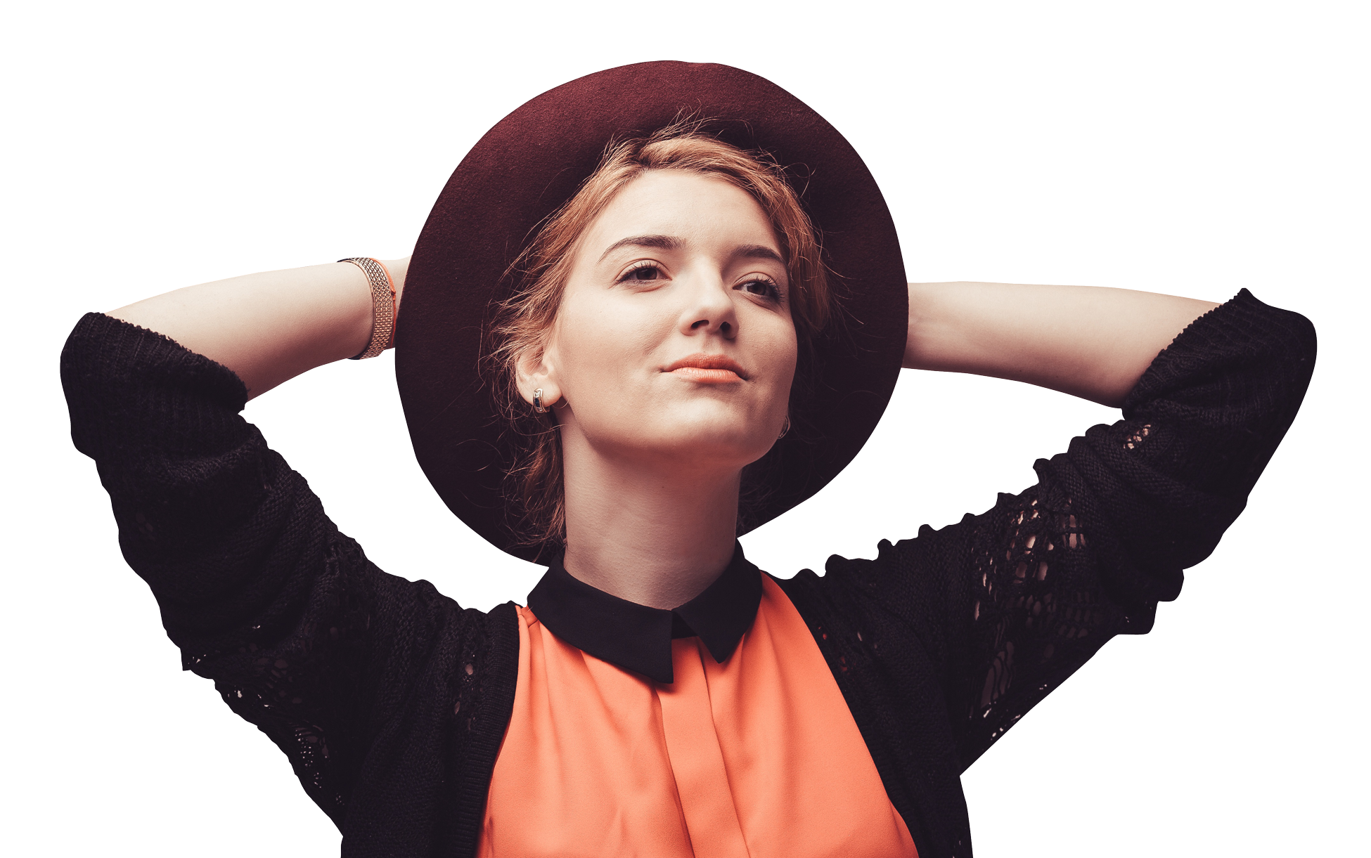 Woman in Burgundy Hat with Hands Behind Head